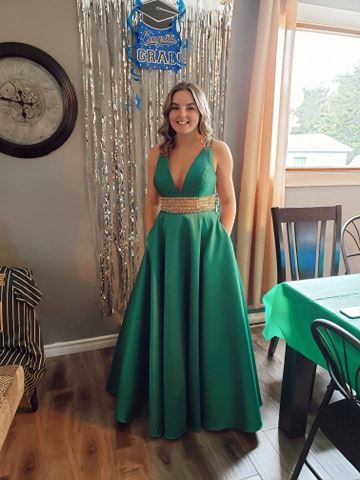 Photo of the prom girl wearing the green dress